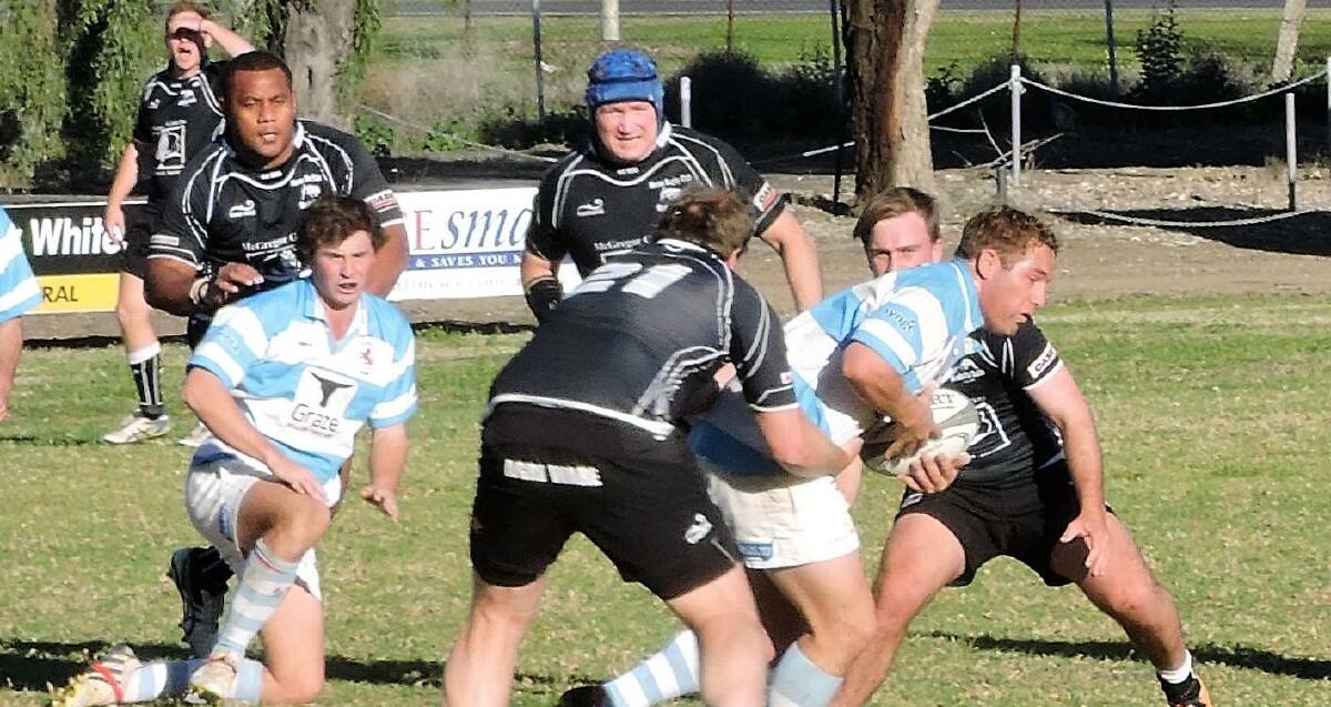 Moree Bull's Joey de Dassel tackles a Quirindi player during Saturday's Central North Rugby Union elimination final. The Bulls won 38-21 to remain in the competition.