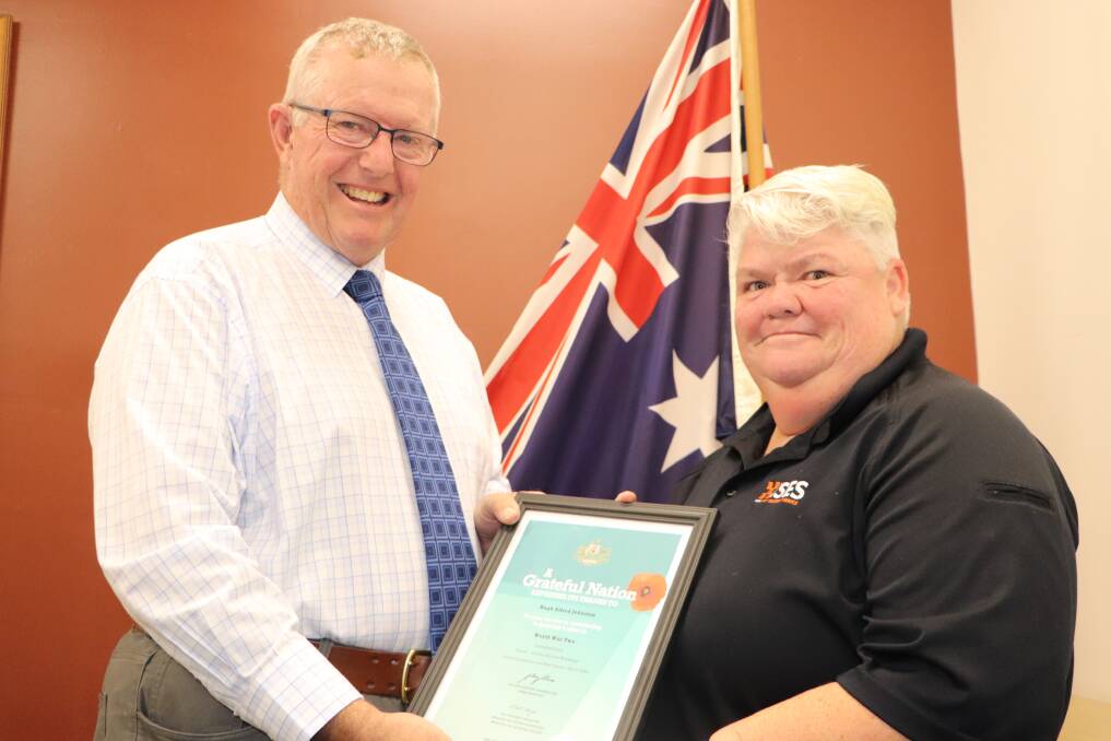 Federal Parkes MP, Mark Coulton, presented three Certificates of Appreciation to Kamala Wheeler to recognise the military service of her father Eric George Johnston, grandfather Hugh Alfred Johnston and great uncle Charles Leonard Johnston. Picture supplied