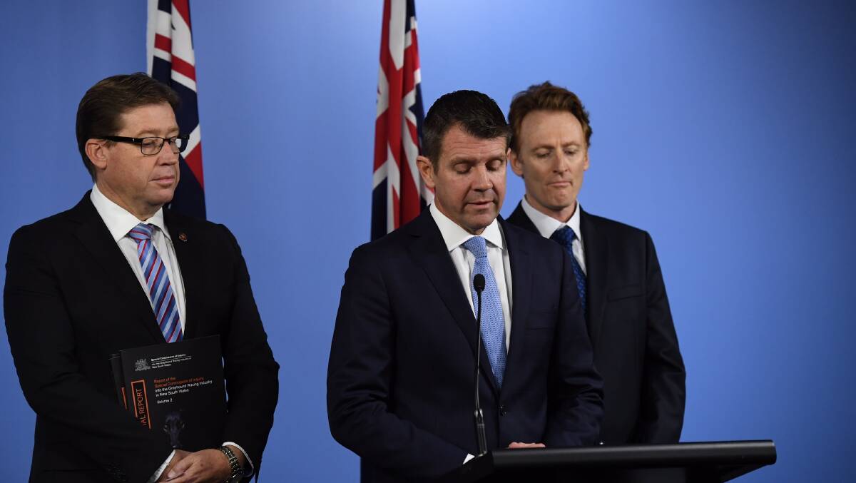 NSW Premier Mike Baird and Deputy Premier Troy Grant reveal the findings of the Special Commission of Inquiry report in July. Photo: Peter Rae