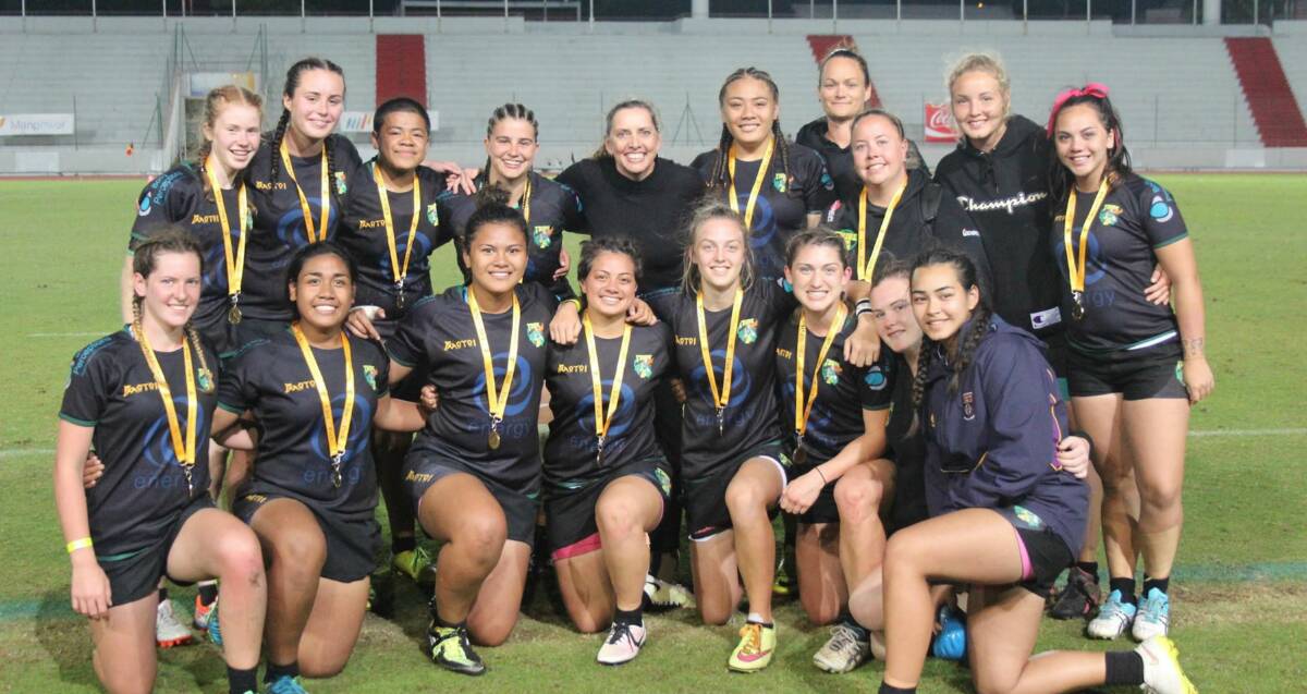 WINNERS: Tiarna Molloy (second left in the back row) captained the Tribe team when it won the New Caledonia Invitational 7s.