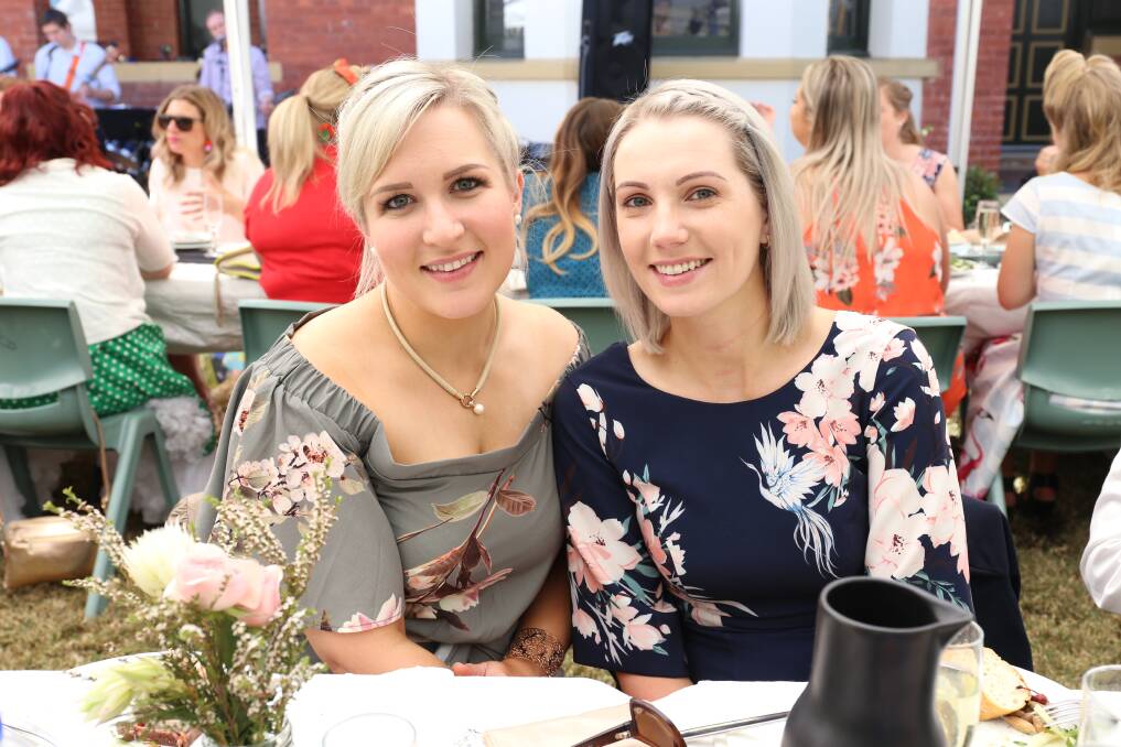 SPRING FEAST: Sarah and Danielle Densley looking lovely in floral prints. Photo: Georgina Poole.