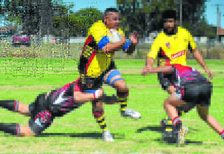 A Boomerang player tries to evade a tackle during a match in 2015. The Boomerangs will begin their 2017 season at home against the Armidale Rams.