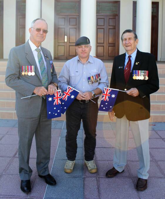 TIME TO REFLECT: Moree RSL Sub-branch vice-president and MC for Anzac Day Roger Butler, parade marshall Mark Armstrong and former parade marshall Des Hurst.
