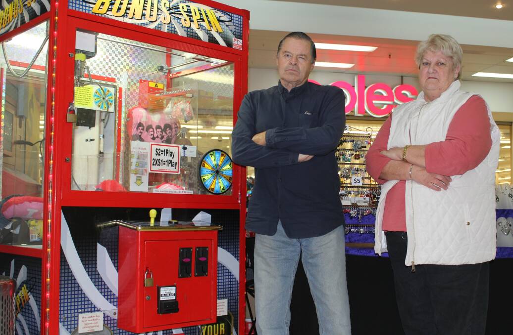 DISAPPOINTED: Moree residents Ron Turton and Lyn Tooth are not impressed by the recent removal of the NAB ATM from Balo Square.
