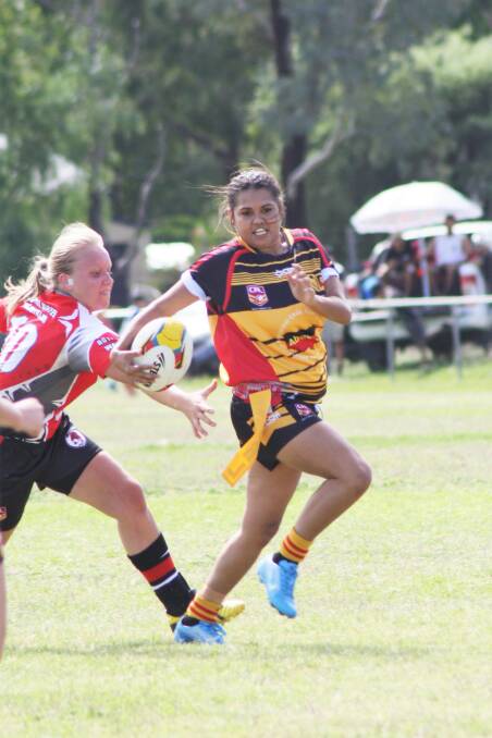 TACKLING LEAGUE: Moree Boomerangs ladies league tag player Rebecca Sampson in action. The ladies will be competing in the Group 19 women's nines tournament this weekend. Photo: Raquel Clarke