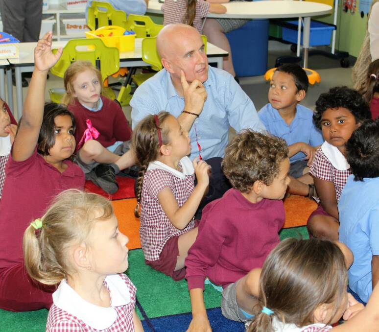 IN HIS ELEMENT: Education Minister Adrian Piccoli joined kindergarten students in a lesson at Moree East Public School during his visit to Moree schools on Tuesday. 