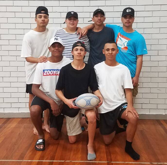 REPRESENT: (Back) Dwayne Smith, Daniel Smith, Locky McGrath, Caleb Duncan, (front) Mark Pegus, Malu French and Darryl McGrady are some of the boys competing in the rugby league 7s at the Nations of Origin tournament this week.