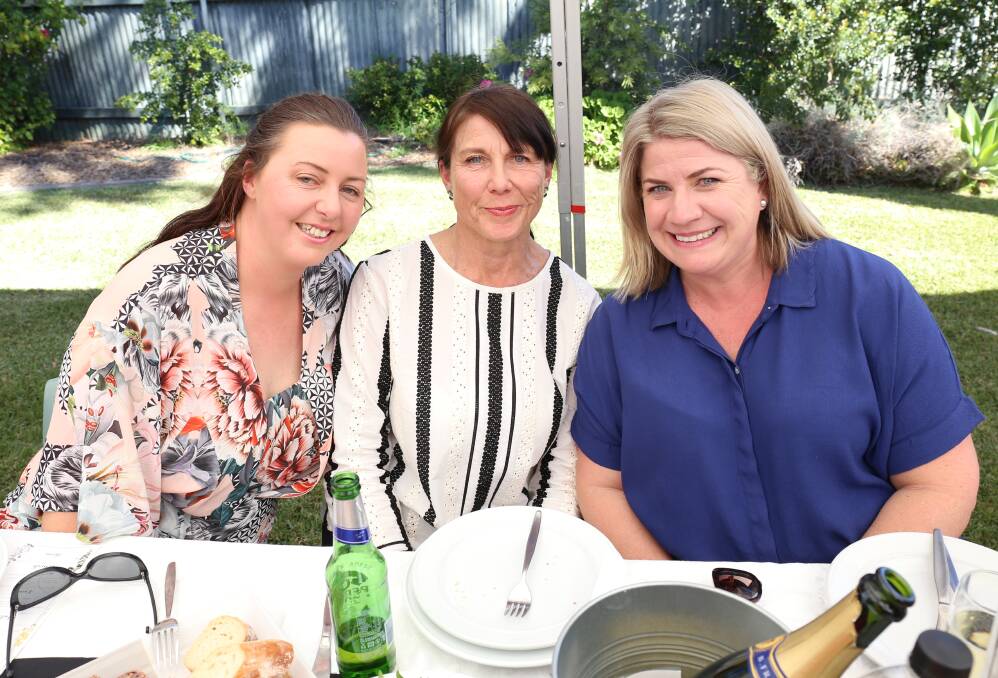 WELL-EARNED LUNCH: Hard working committee members Marguerite McCormick, Penny Holliday and Ros Van Dongen finally relax. Photo: Georgina Poole.