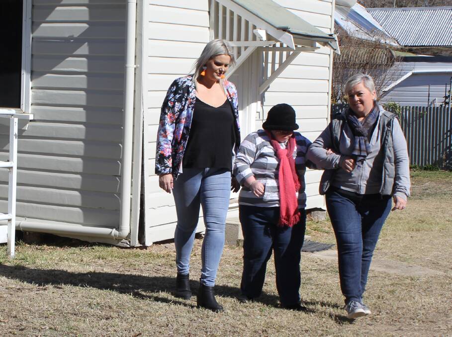 PERSONAL SUPPORT: Candice Dover with Moree client Jenna O'Neill and Jenna's sister Melissa Salis, checked out the gardens at Candice's House this week.