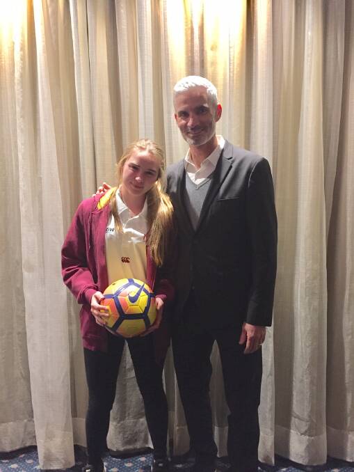 Amy-Louise Armstrong with ex-Socceroo and commentator on SBS Football, Craig Foster.