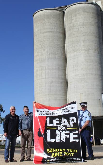 CHALLENGE: Westpac Rescue Helicopter Service's Jeff Galbraith with two leaders, McDonalds licensee Robert McAllister and Barwon LAC Superintendent Paul McDonald.