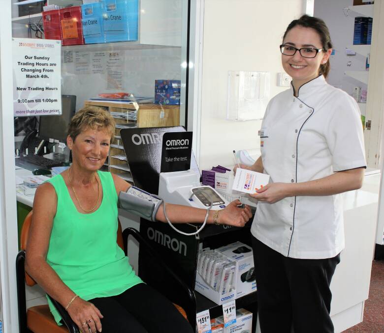 HEALTHY HEART: Sue Chittock gets her blood pressure checked by Moree Discount Drug Store pharmacist Elsie Barnes during Red Feb Heart Research Month.