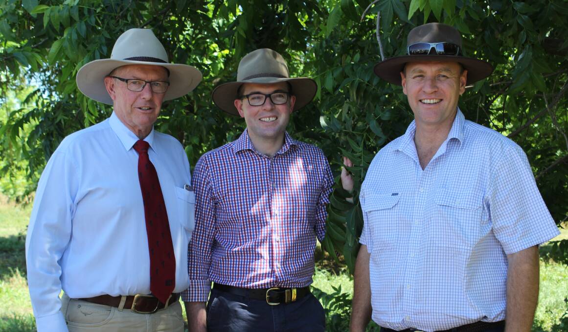 Stahmann Farms CEO Ross Burling (right) gives Federal Member for Parkes Mark Coulton and Northern Tablelands MP Adam Marshall a tour of the pecan farm at Pallamallawa.