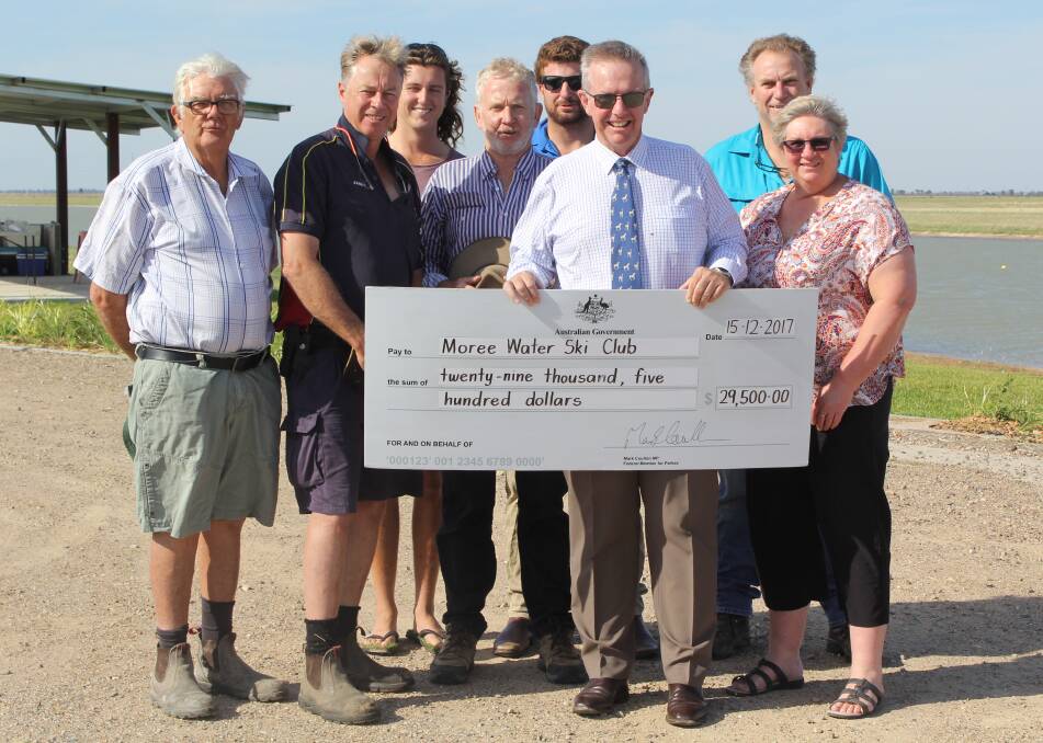 ENVIRONMENTAL WIN: Federal Member for Parkes Mark Coulton presents members of Moree Water Park, Work for the Dole supervisor Colin Arthur (left) and Joblink Plus regional manager Francine Hodgkinson (right) with $29,000 to plant 7,000 trees.