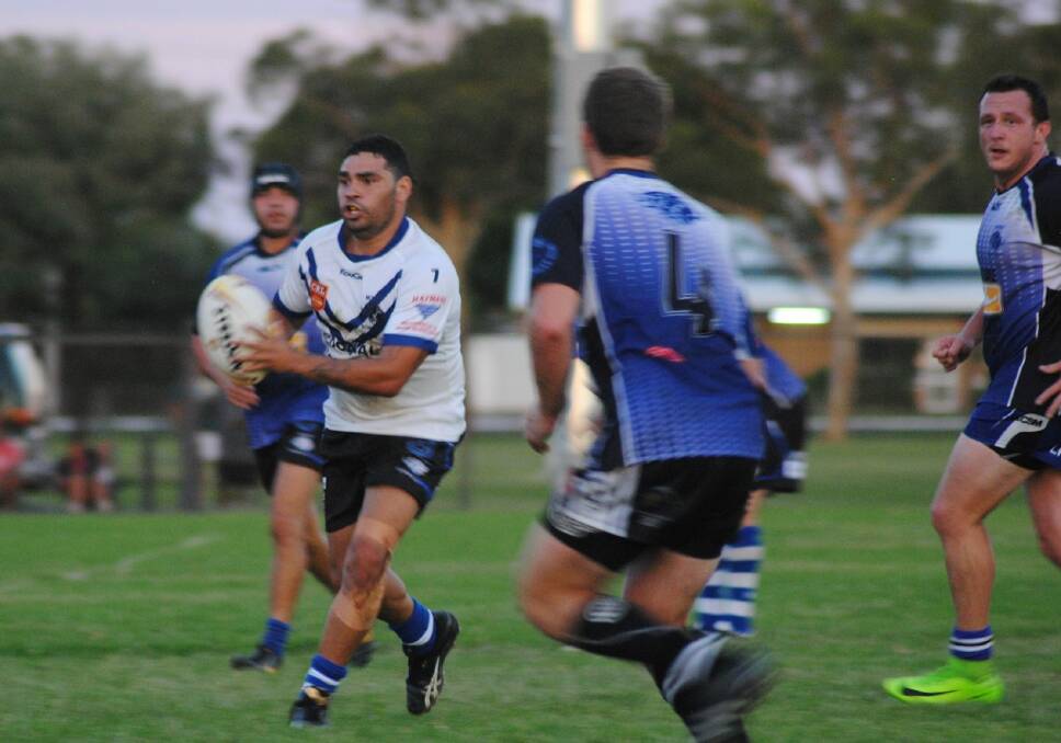 IN CONTROL: Wayne Swan takes possession of the ball during Saturday's successful trial match against the McIntyre Warriors. The Boars came back from being down 18-4 to win 20-18. Photo: Deb Holland.
