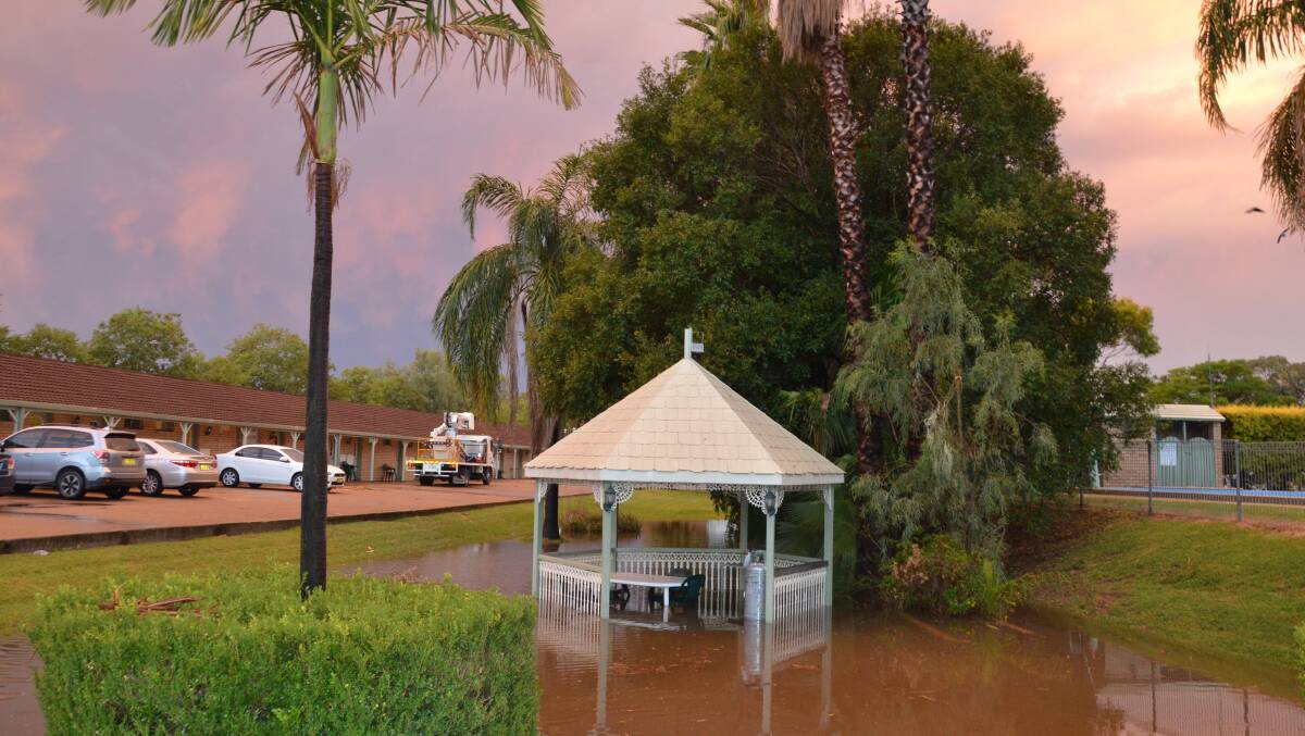 The gazebo at Burke and Wills Motor Inn was flooded under water. Photo: Naomi Shumack.