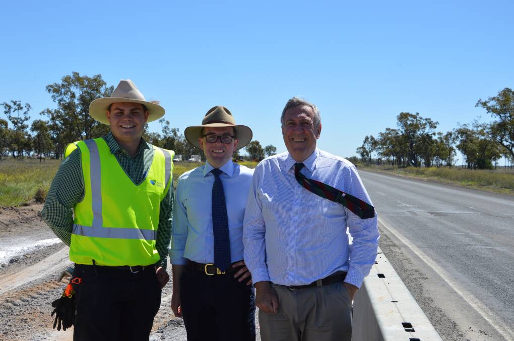 PASSING PROGRESS – Roads Minister Duncan Gay, right, with Northern Tablelands MP Adam Marshall, centre, get an on-site update from RMS works project manager Scott Rickard on the new overtaking lane at Wallon Creek on the Newell Highway.