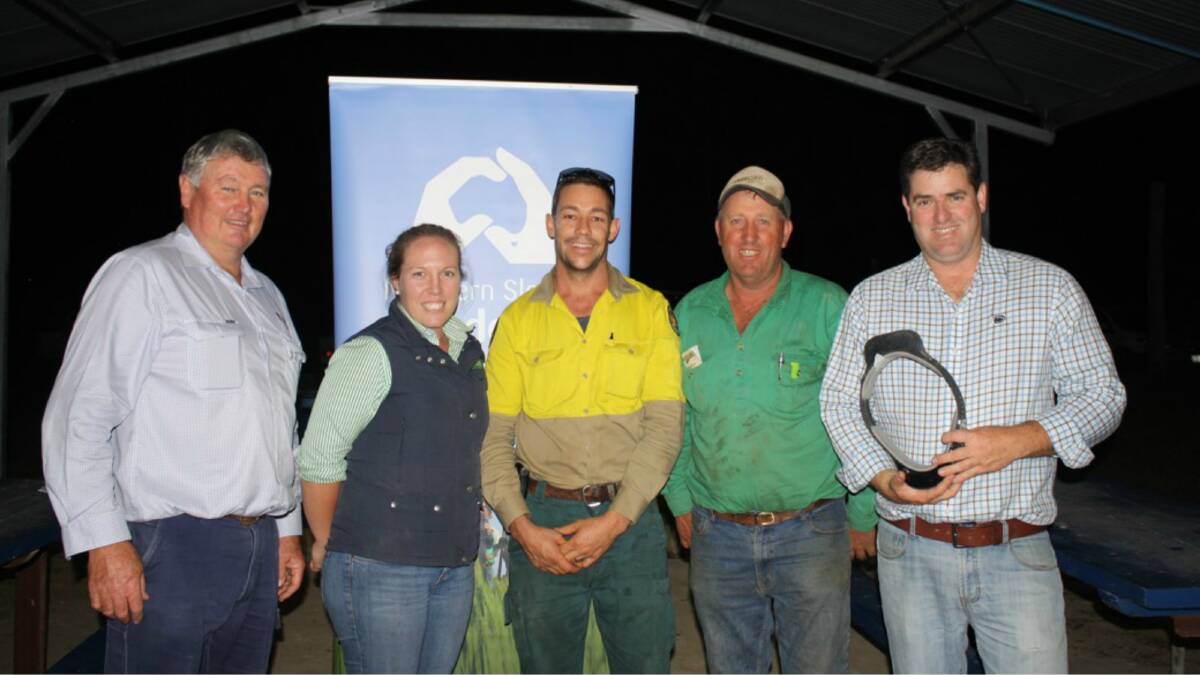 TARGETING: North West Local Land Services’ Biosecurity Officer, David Lindsay, Northern Slopes Landcare Association’s Brianna Middlemiss, Nationals Parks’ Mark Barrow, Bellata landholder Scott Hann and Feral Animal Researcher QMDC, Darren Marshall inspect one of the pig collars.