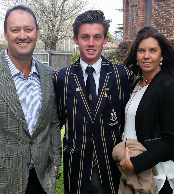 Graduation day: All-rounder Jarrod with mum and dad, Glenn and Linda Bourke after receiving two awards at The Armidale School.