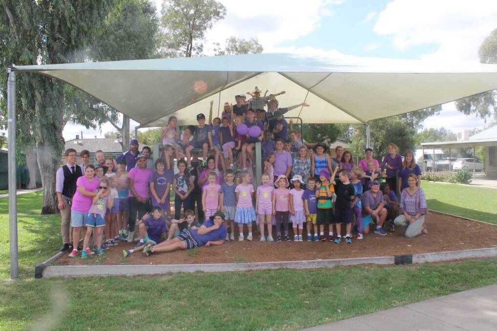 Bright: The whole school wore dribs and drabs of purple clothes, ribbons and shoes to promote the end of stigma and discrimination toward epilepsy.