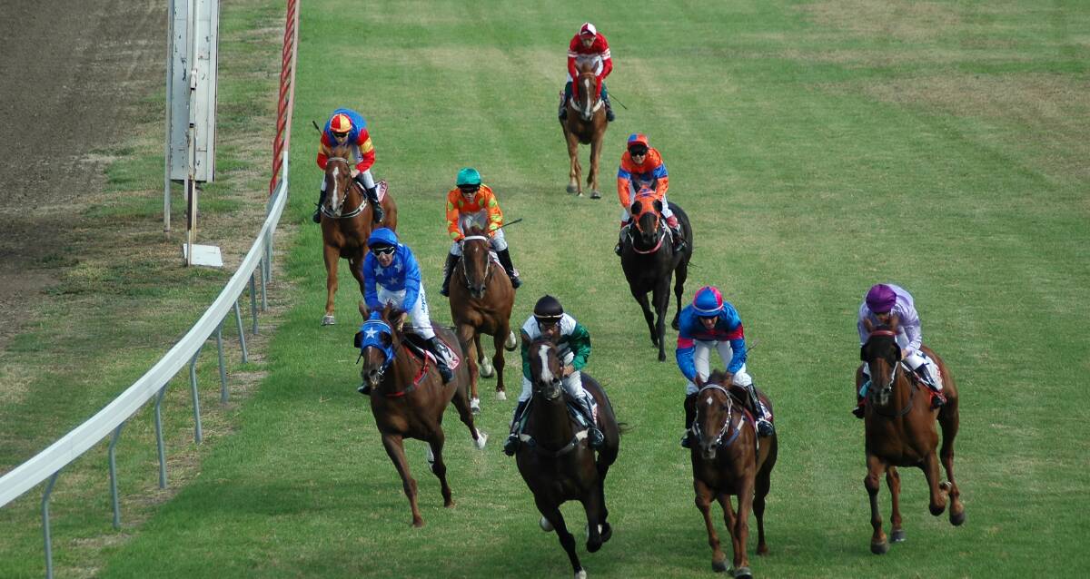 Finish post: Danny Frahm (third from right) races home to win the Moree Jockeys' Challenge in 2008.