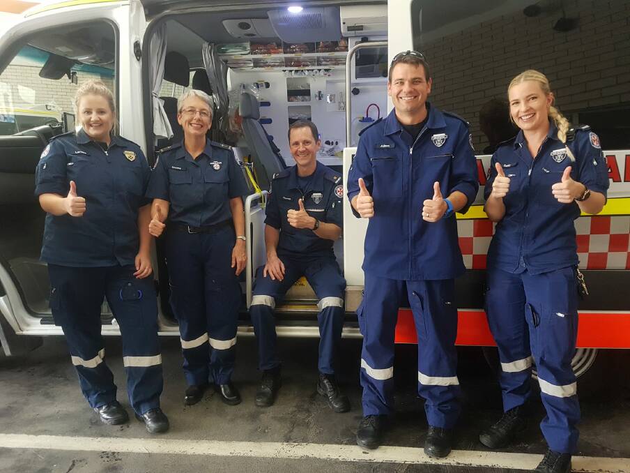 Thumbs up: Paramedics Larissa Schausinger, Ambulance Chaplain Donna Boughton, Thomas Claringbold, Adam Russell and Sally Bull.