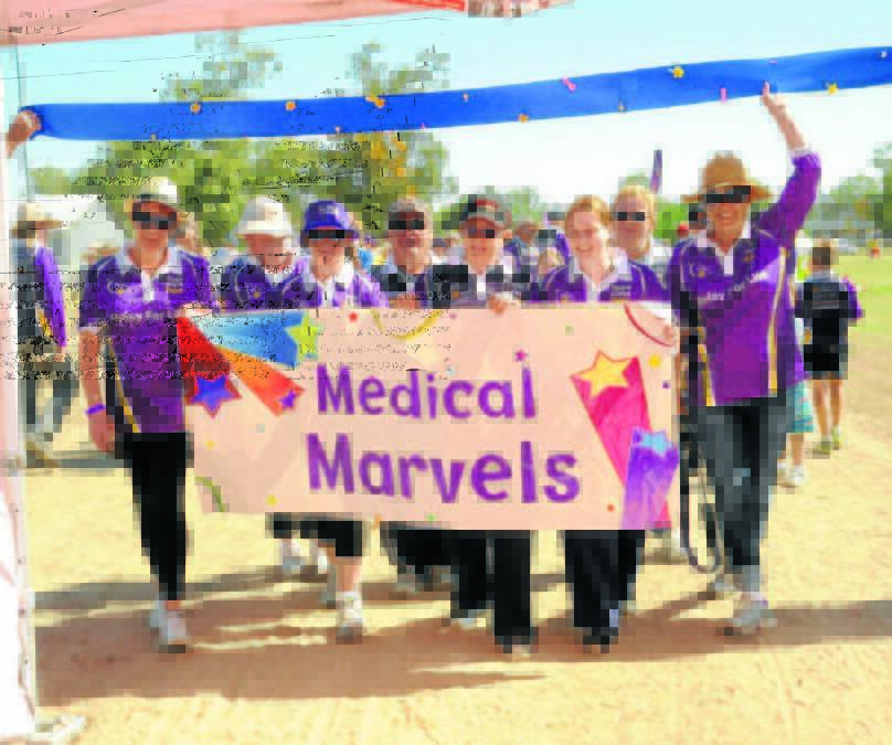 Relay complete: Moree's Medical Marvels crossed the line as a strong unit at the 2014 Relay for Life.