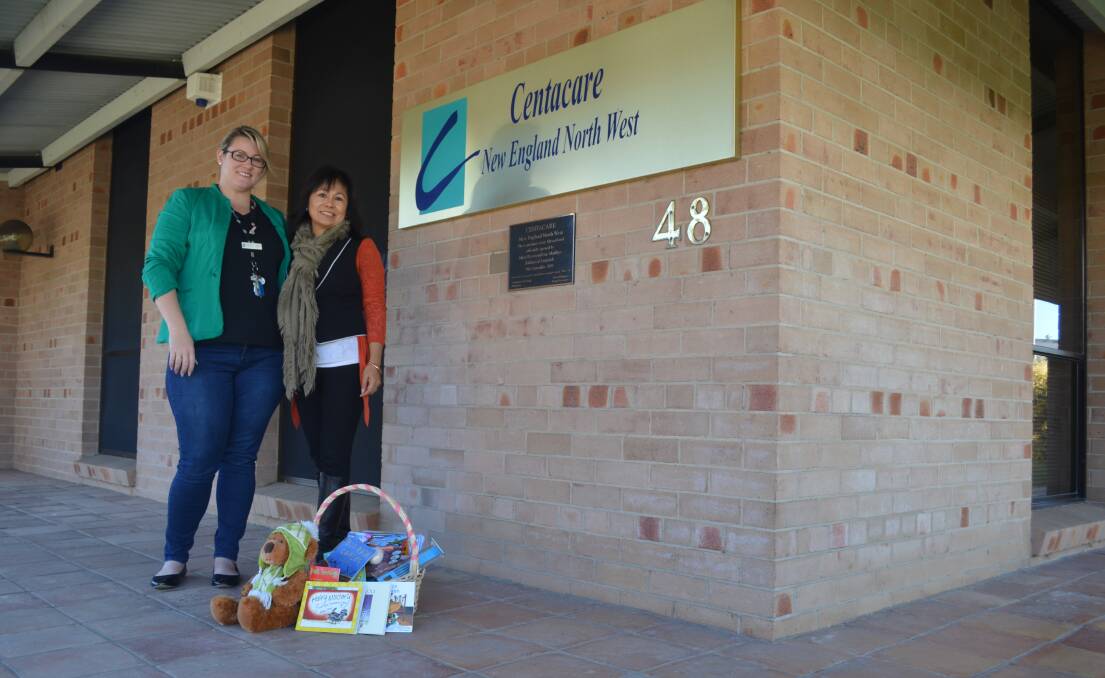 Centacare's Lisa Moore and Malou Deakin with a preview of the many items that will be donated to school children in the Philippines.