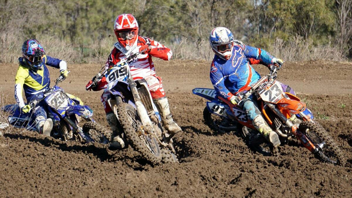 Neck and neck: Jesse Moore, Trent Loder and Tyler Johnson compete in A-Grade of the Moree Motorcycle Club Day at Boolooroo Raceway on Sunday.
