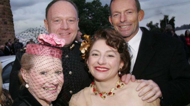 Bronwyn Bishop at the wedding of Sophie Gregory Mirabella, with Prime Minister Tony Abbott. and another wedding guest, in 2006.  Photo: Rebecca Hallas 