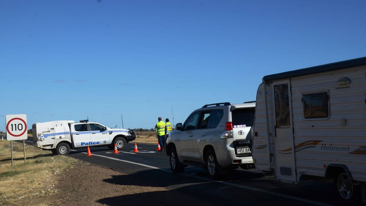 ROAD BLOCK: Police closed the Newell Highway at Moree during the wild chase to try and stop the stolen vehicle which caught alight near Gurley. Photo: Matthew Purcell