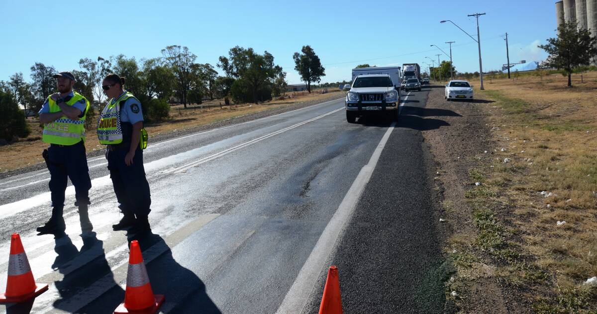 ROAD BLOCK: Police stop traffic on the outskirts of Moree on Wednesday. Photo: Matthew Purcell
