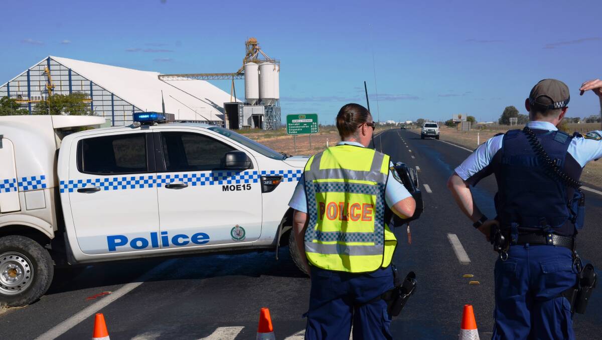 ROAD BLOCK: Police closed the Newell Highway at Moree during the wild chase to try and stop the stolen vehicle which caught alight near Gurley. Photo: Matthew Purcell