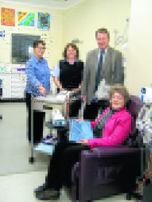 Moree's McGrath Foundation breast cancer nurse Wendy Allen (centre) with Bronwyn Cosh, Kevin Humphries and Marie Onus (front) in the oncology unit.