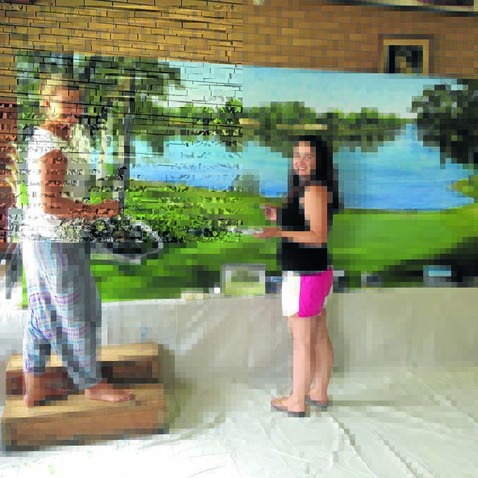 Nine artists work on large Mehi river painting