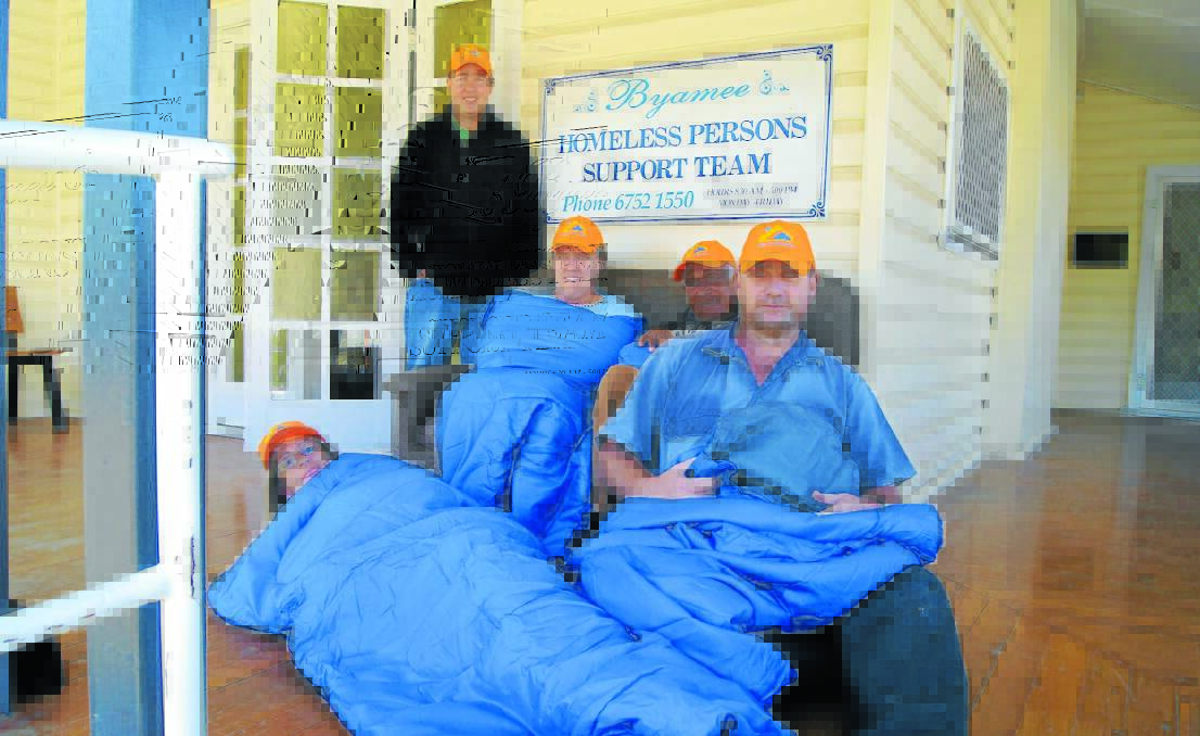 Leigh Smith, Joanne Williams, Lloyd Duncan, Tim Wheeler and Amanda Browning, in the rentable sleeping bags, prepare this Friday night’s sleep-out.