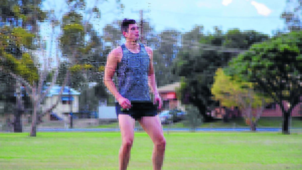 Moree's James Mulligan, former Western Bulldogs player, trains with the Suns on Tuesday afternoon.