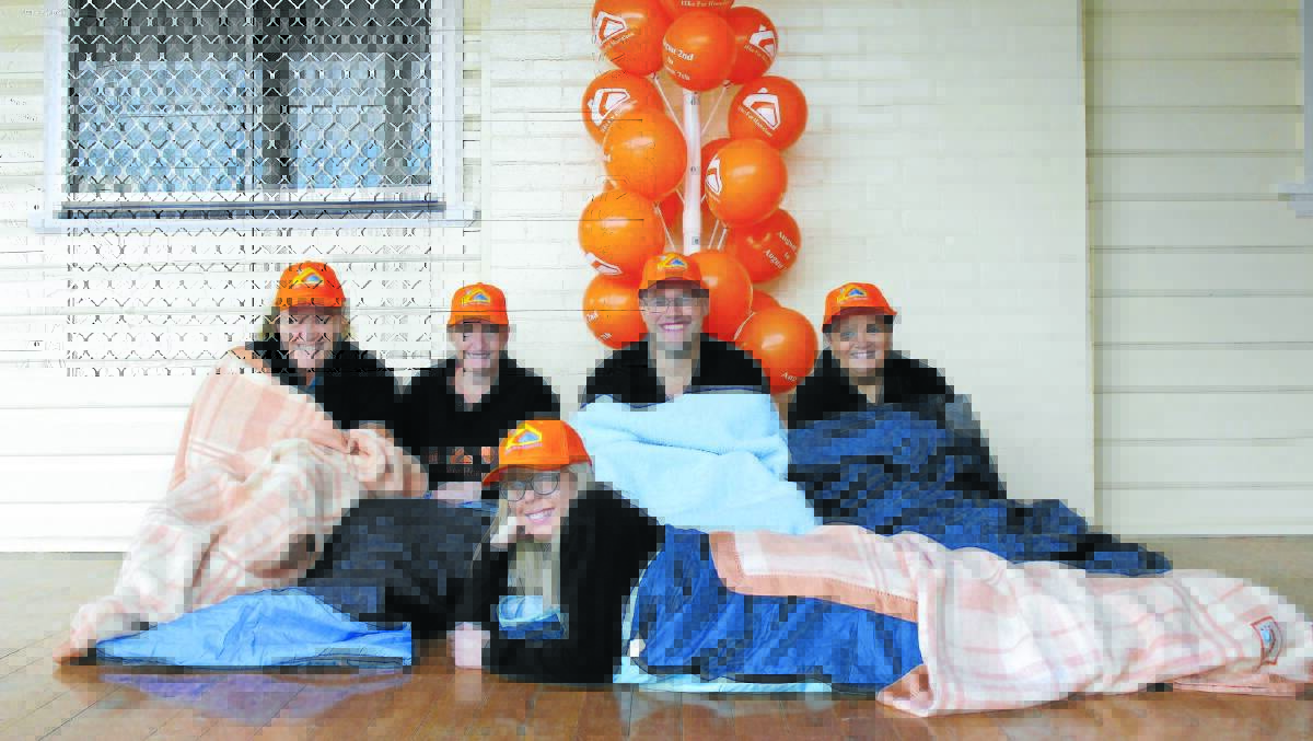 ROUGHING IT: Moree Area Homelessness Services employees Joanne Williams, Anna, Jared Lidgerwood, Betty-Jo Bartholomew and Giselle Cartridge (in front) are set for the annual sleep-out next week.