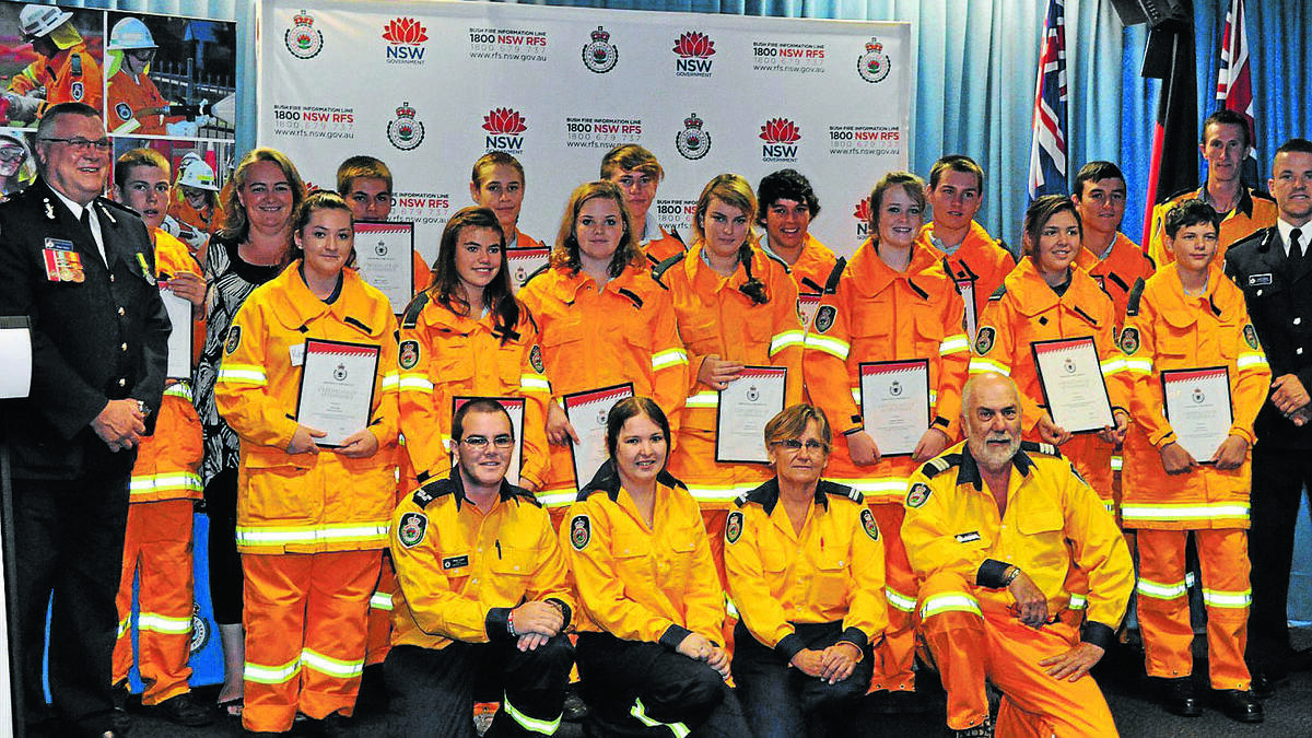 COMMUNITY SPIRIT ON FIRE: Manilla Central School Rural Fire Service cadets graduate with NSW RFS Assistant Commissioner Steve Yorke in Sydney. Photo: NSW RFS