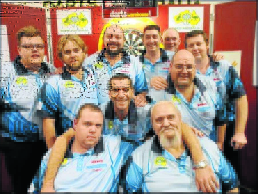 Moree’s Kyle Munro (at back, second from left) and the NSW men’s green team celebrate their win at the Australian Darts Championships.