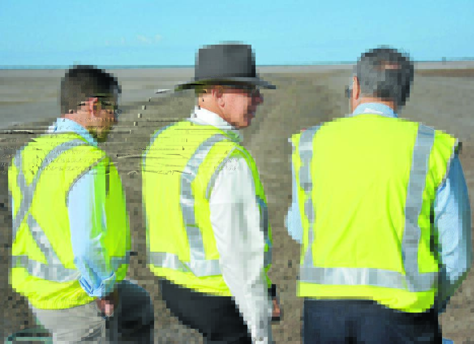 Governor David Hurley (centre) surveys the site of the future ski park with Adam Marshal (left) and Moree Plains Shire Council's John Carleton. 