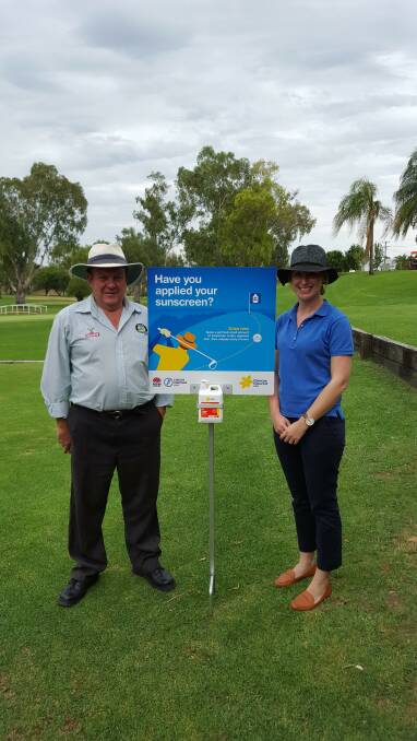 Scott McLeod, Golf club manager and Dimity Chaseling, Community Programs coordinator for Cancer Council NSW, Northwest area.
 
