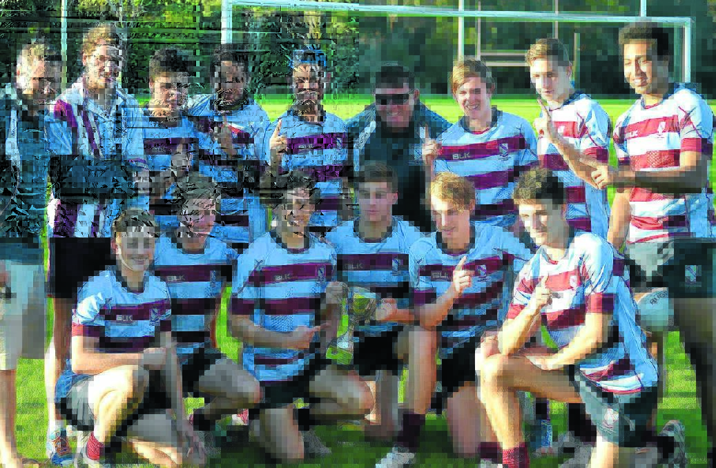 St Gregory’s, including Allan McKenzie back row, fourth from the left, are the NSW Rugby 7 Champions.