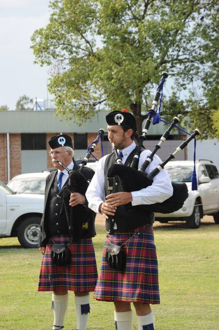 Members of the Moree Caledonian Pipes and Drums