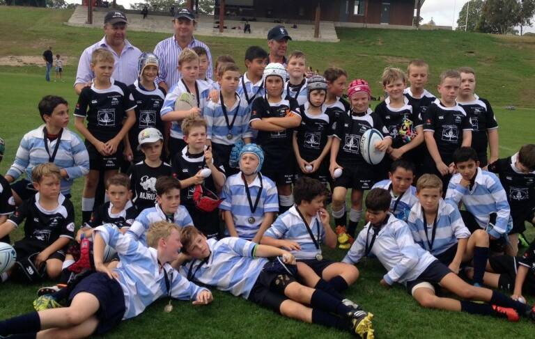 Moree Weebolla Bulls players with their Kings School opponents last Saturday.