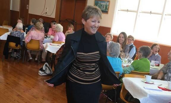 Sue Chittock displays her modelling style on the catwalk yesterday.