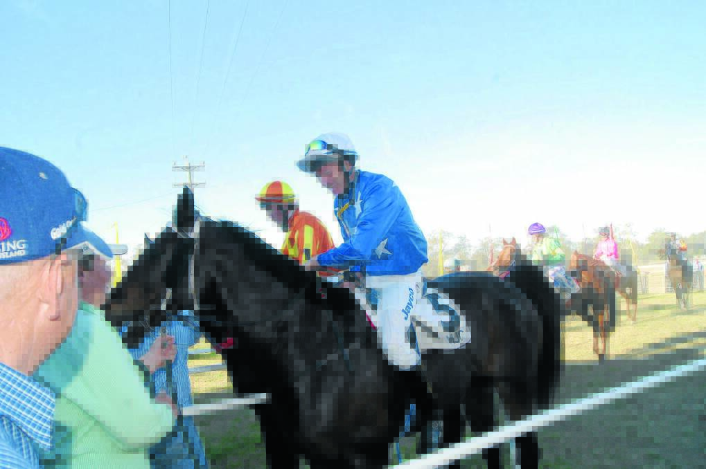 Champion country jockey Geoff Snowden steered Looped to a comfortable win in the Mungindi Cup.