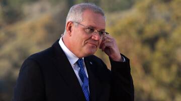 Prime Minister Scott Morrison undertaking morning television interviews on election day. Picture: AAP