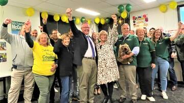 THE WINNING TEAM. Mark Coulton, his wife Robyn, and the Nationals Party team celebrated at Dubbo on Saturday night after confirming his win. PICTURE: ELIZABETH FRIAS 