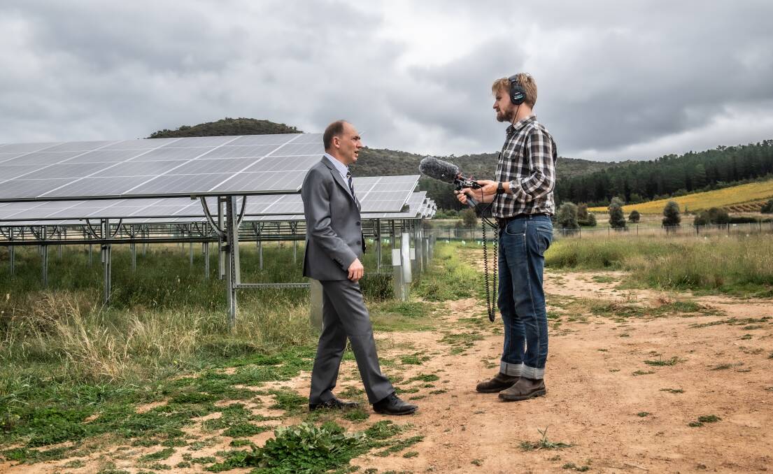 IN THE FIELD: ACM podcast journalist Tom Melville interviews Nick Fejer, chair of Solarshare. Picture: Karleen Minney